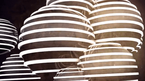 rotating striped orbs web design