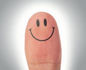 smiley face on thumb