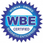 Official Woman-Owned Business Enterprise (WBE) certification badge featuring a jagged blue and white circular seal.